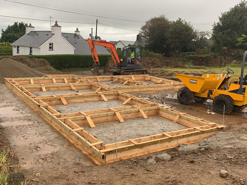framework - laying foundation on construction site